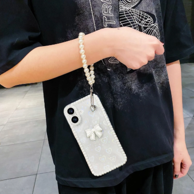 Case with pearl wrist strap