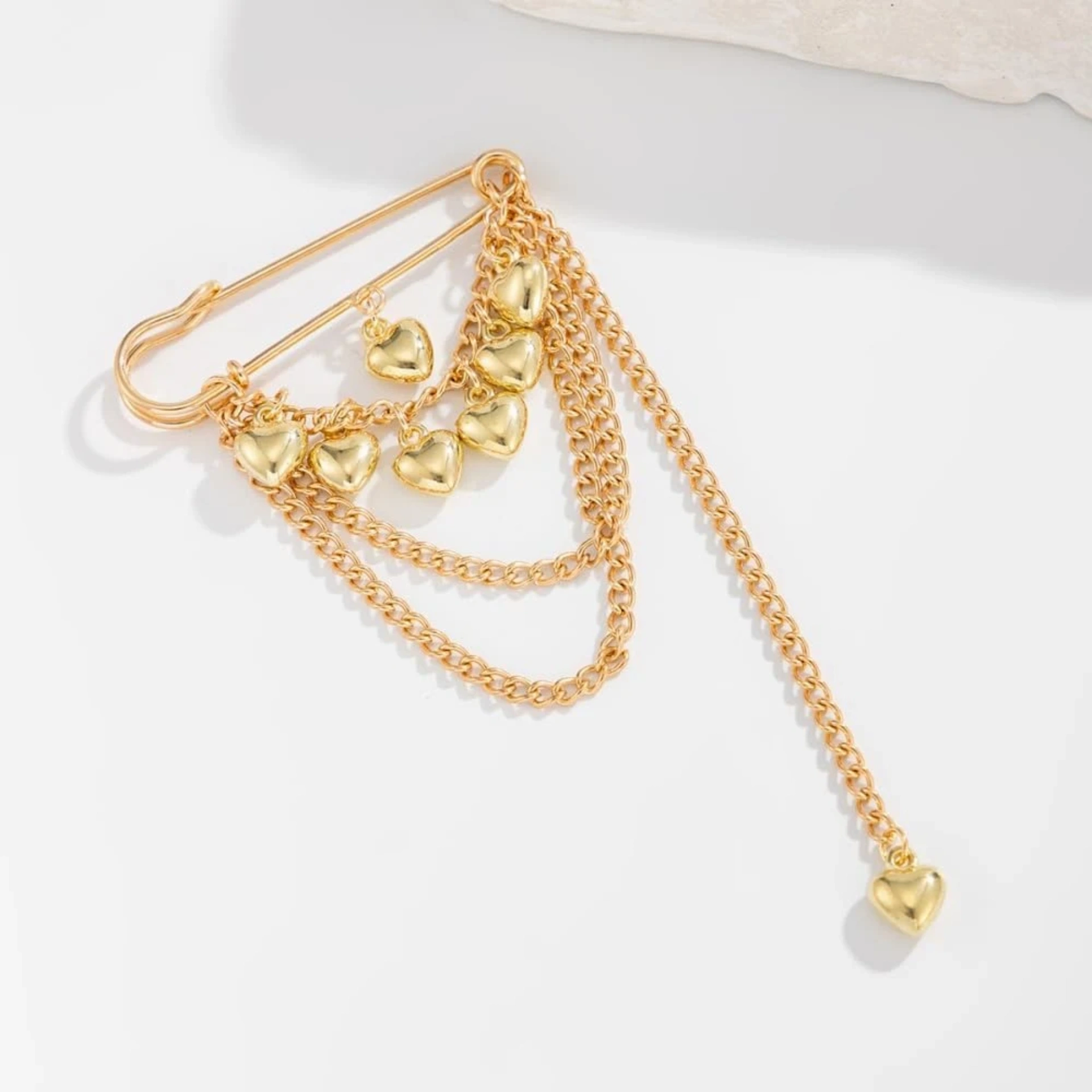 Golden hearts pin