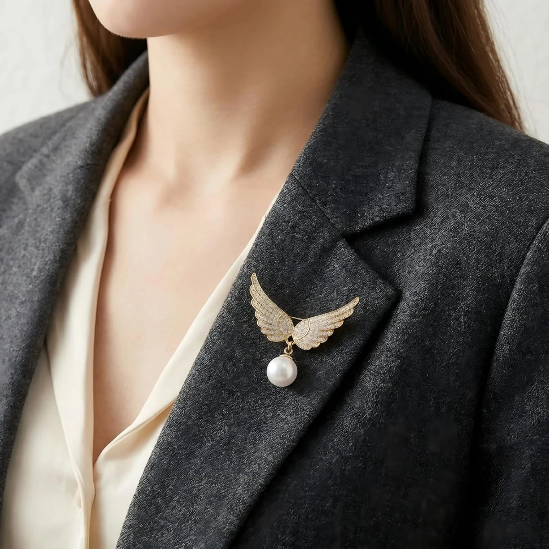 Angel wing pearl brooch