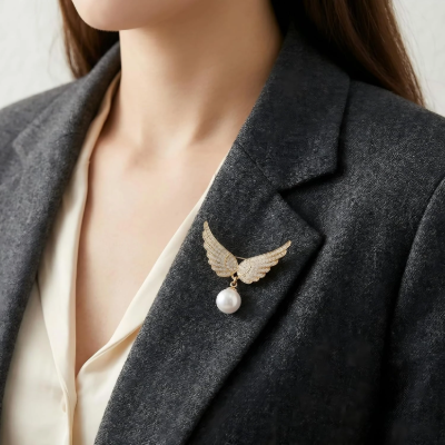 Angel wing pearl brooch